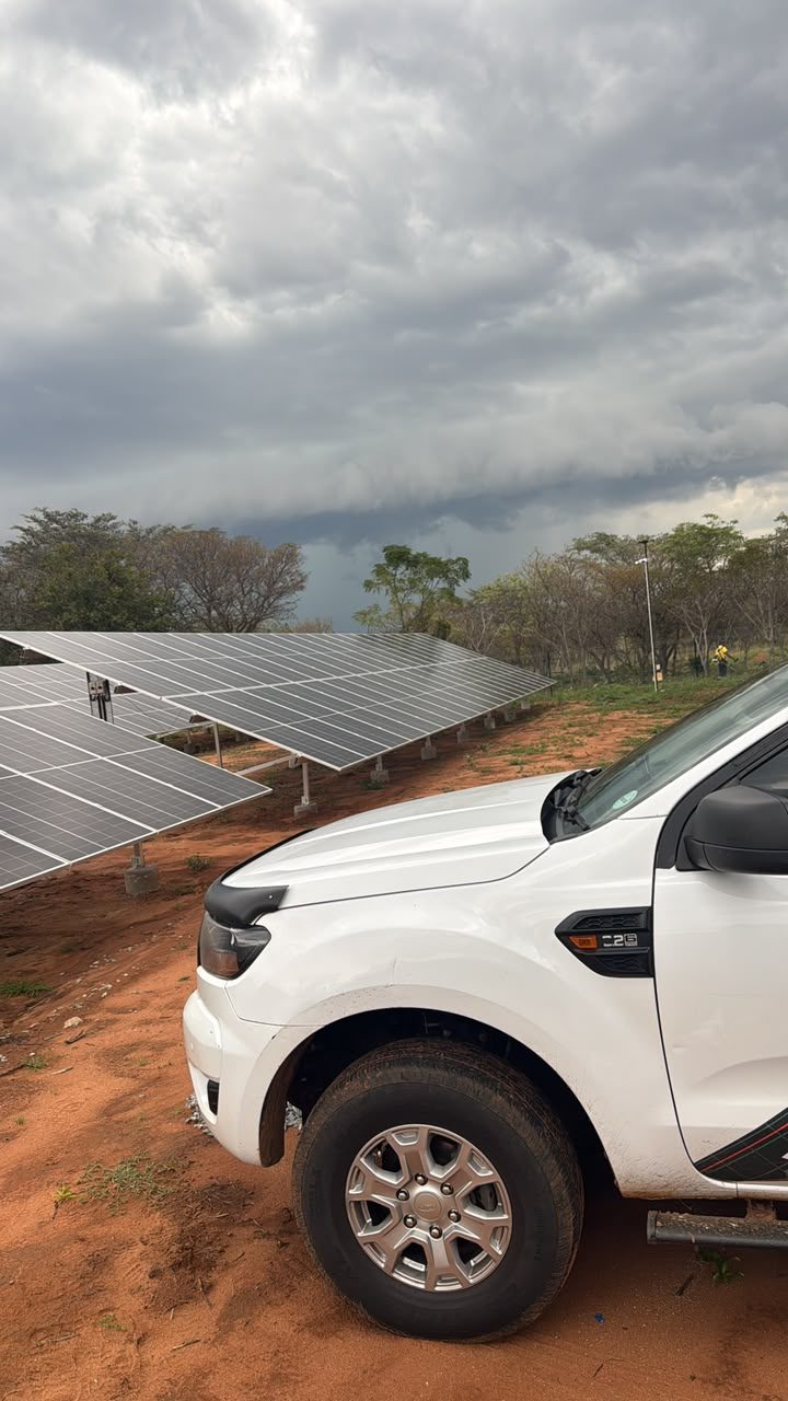 Fenced ground-mount array under commissioning